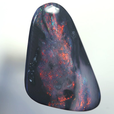 SOLID BLACK OPAL Cherry red and copper. SEE VIDEO